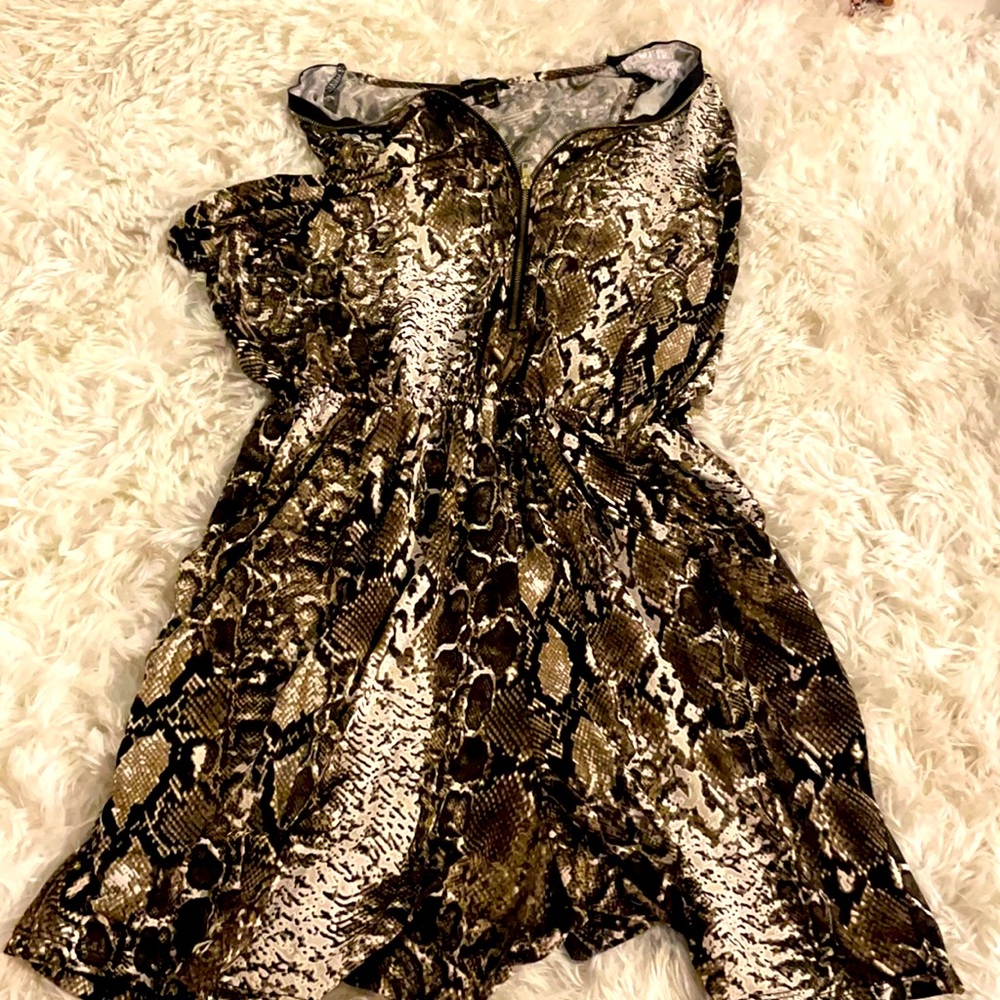 Snake print front zip up romper.